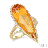 26x9 MM Pear Shape Citrine and 1/3 Ctw Round Cut Diamond Halo Semi-Precious Ring in 14K Yellow Gold