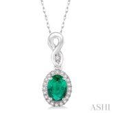 6x4 MM Oval Cut Emerald and 1/10 Ctw Round Cut Diamond Pendant in 14K White Gold with Chain