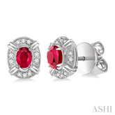 5x3 MM Oval Cut Ruby and 1/10 Ctw Round Cut Diamond Earrings in 14K White Gold