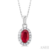 5x3 MM Oval Shape Ruby and 1/20 Ctw Single Cut Diamond Halo Precious Pendant with Chain in 14K White Gold