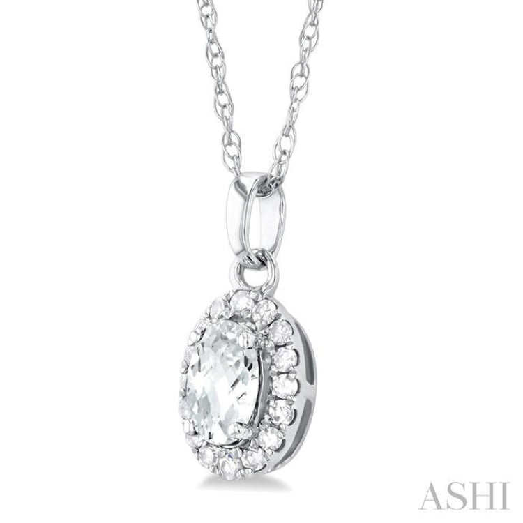 5x3 MM Oval Shape White Topaz and 1/20 Ctw Single Cut Diamond Halo Semi-Precious Pendant with Chain in 10K White Gold 5x3 MM Oval Shape White Topaz and 1/20 Ctw Single Cut Diamond Halo Semi-Precious Pendant with Chain in 10K White Gold