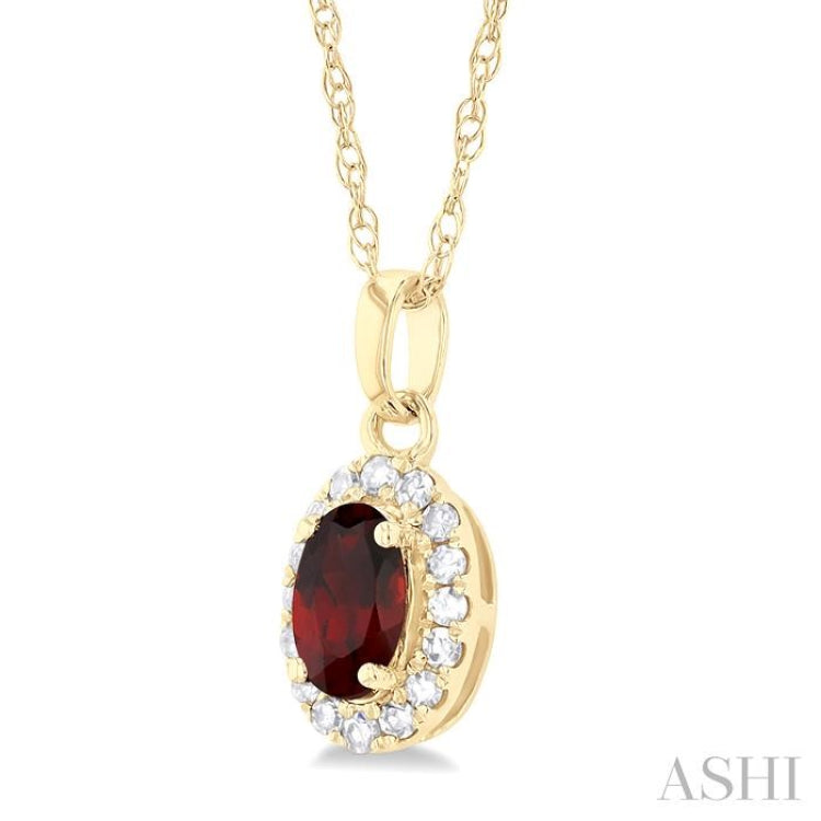 5x3 MM Oval Shape Garnet and 1/20 Ctw Single Cut Diamond Halo Semi-Precious Pendant with Chain in 10K Yellow Gold 5x3 MM Oval Shape Garnet and 1/20 Ctw Single Cut Diamond Halo Semi-Precious Pendant with Chain in 10K Yellow Gold