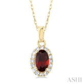 5x3 MM Oval Shape Garnet and 1/20 Ctw Single Cut Diamond Halo Semi-Precious Pendant with Chain in 14K Yellow Gold