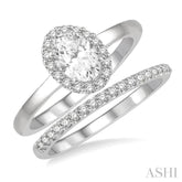 3/8 Ctw Round Cut Diamond Wedding Set With 1/3 Ct Halo 1/4 Ct Oval Cut Center Stone Engagement Ring and 1/10 Ct Wedding Band in 14K White Gold