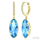 12X5 MM Oval Shape Blue Topaz and 1/10 Ctw Round Cut Diamond Semi-Precious Earrings in 10K Yellow Gold