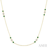2.25 MM Emerald and 1/2 Ctw Round Cut Diamond Precious Station Necklace in 14K Yellow Gold