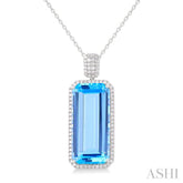 26X12 MM Emerald Cut Blue Topaz and 1/2 Ctw Round Cut Diamond Halo Semi-Precious Pendant With Chain in 14K White Gold