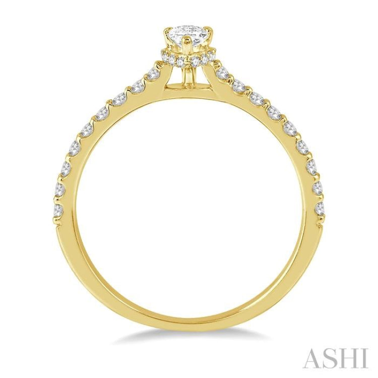 1/5 Ctw Pear Shape Round Cut Diamond Semi-Mount Engagement Ring in 14K Yellow Gold