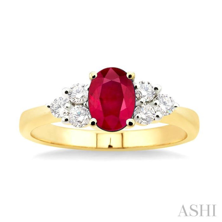 7x5mm Oval Cut Ruby and 1/3 Ctw Round Cut Diamond Ring in 14K Yellow Gold