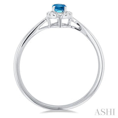 5x3 MM Oval Shape Blue Topaz and 1/20 Ctw Single Cut Diamond Halo Semi-Precious Ring in 14K White Gold