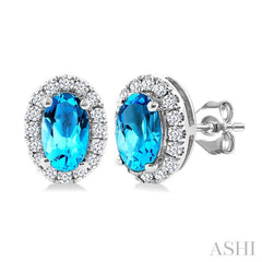 5x3 MM Oval Shape Blue Topaz and 1/8 Ctw Round Cut Diamond Halo Semi-Precious Stud Earrings in 14K White Gold