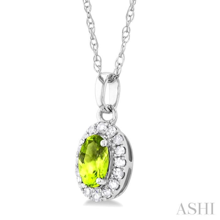 5x3 MM Oval Shape Peridot and 1/20 Ctw Single Cut Diamond Halo Semi-Precious Pendant with Chain in 14K White Gold