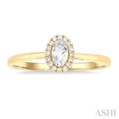 5x3 MM Oval Shape White Topaz and 1/20 Ctw Single Cut Diamond Halo Semi-Precious Ring in 14K Yellow Gold
