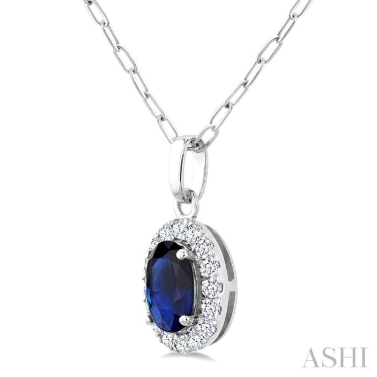 6x4 MM Oval Shape Sapphire and 1/6 Ctw Round Cut Diamond Halo Precious Pendant with Chain in 14K White Gold
