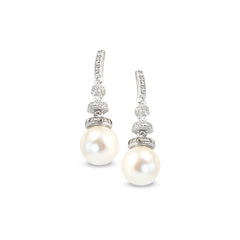Platinum finish sterling silver micropave round pearl drop earrings with simulated diamonds