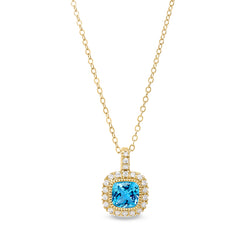 Gold finish sterling silver micropave simulated blue zircon pendant with simulated diamonds on 18 cable chain