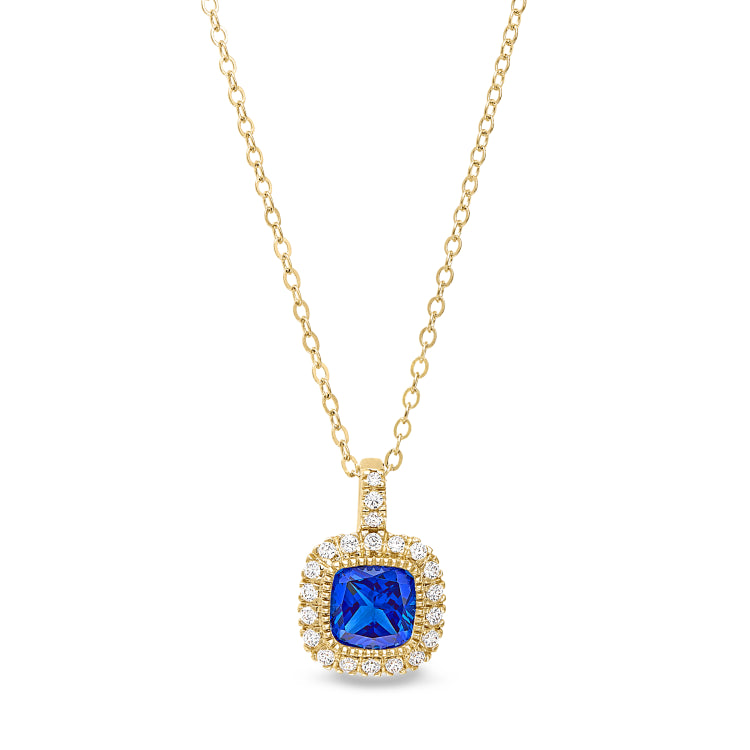 Gold finish sterling silver micropave simulated blue sapphire pendant with simulated diamonds on 18 cable chain