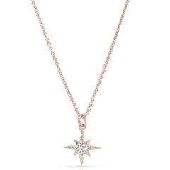 Rose gold finish sterling silver micropave starburst pendant with simulated diamonds on 16-18 adjustable chain