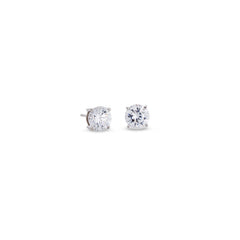 Platinum finish sterling silver prong set round simulated diamond earrings approx. 1cttw