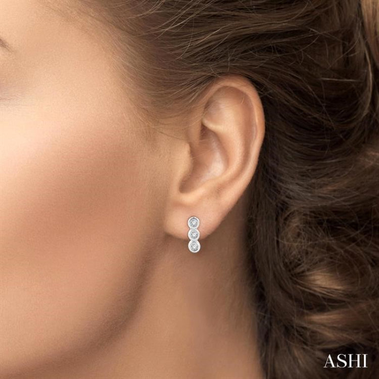 1/10 Ctw Petite Bezel Set Round Cut Diamond Fashion Stud Earrings in 10K White Gold