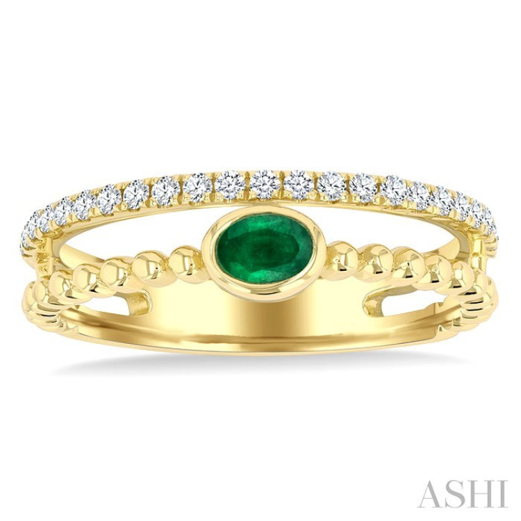 4x3 MM Oval Shape Emerald and 1/5 Ctw Round Cut Diamond Precious Fashion Split Twin Ring in 10K Yellow Gold