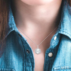 1/20 Ctw Hexagon fluted medallion Round Cut Diamond Pirouette Pendant With Chain in Sterling Silver
