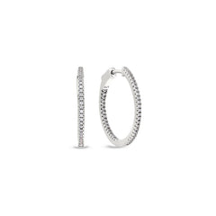 Platinum finish sterling silver micropave inside out medium hoop earrings with simulated diamonds