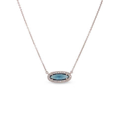 Platinum finish sterling silver necklace with simulated london blue topaz and simulated diamonds on 16 - 18 adjustable chain
