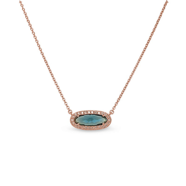 Rose gold finish sterling necklace with simulated london blue topaz and simulated diamonds on 16 - 18 adjustable chain
