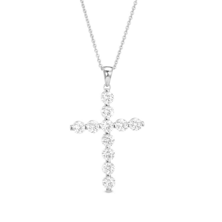 Platinum finish sterling silver fancy beaded bezel set cross pendant with simmulated diamonds on 16 - 18 adjustable chain