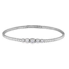 platinum finish sterling silver flexible bracelet with 5 graduated  bezel set simulated diamonds
