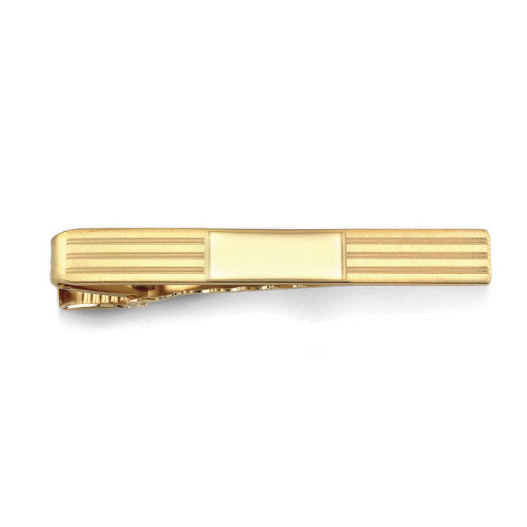 Gold finished engine turned engravable tie bar.