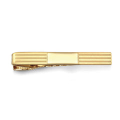 Gold finished engine turned engravable tie bar.