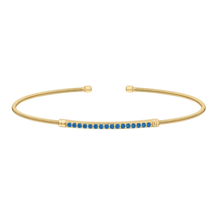 Gold finish sterling silver cable cuff bracelet with simulated blue zircon birth gems - december
