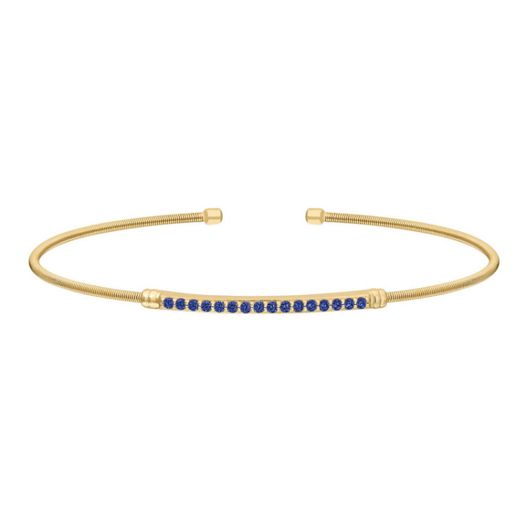 Gold finish sterling silver cable cuff bracelet with simulated blue sapphire birth gems - september