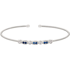Rhodium finish sterling silver cable cuff bracelet with simulated blue sapphire and simulated diamond marquis & round design