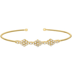 Gold finish sterling silver cable cuff bracelet with three clusters of simulated diamonds