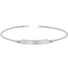 Rhodium finish sterling silver cable cuff bracelet with name plate and simulated aquamarine birth gems - march
