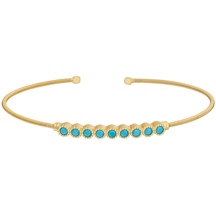 Gold finish sterling silver cable cuff bracelet with beaded bezel set simulated turquoise