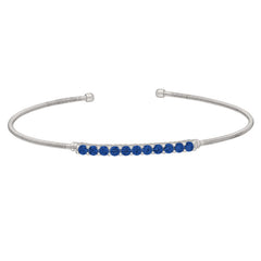 Rhodium finish sterling silver cable cuff bracelet with simulated sapphires