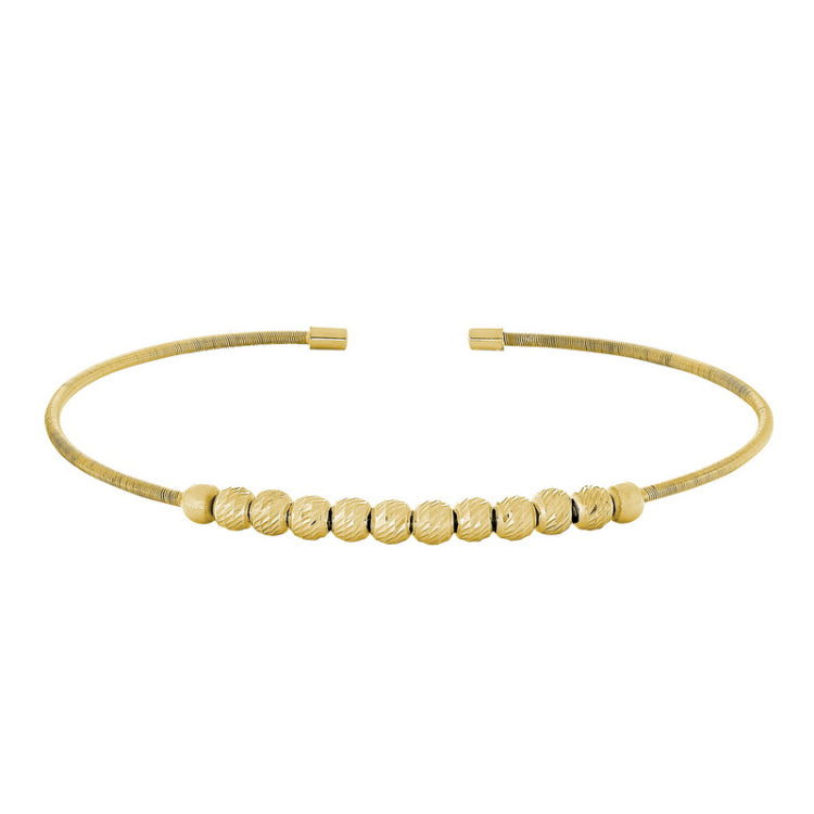 Gold finish sterling silver cable cuff bracelet with ten diamond cut spinning beads