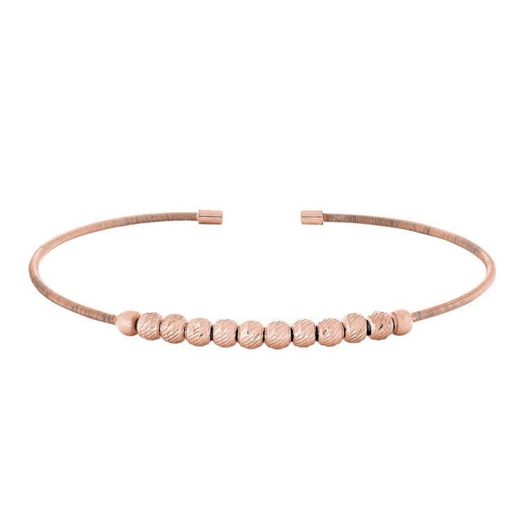 Rose gold finish sterling silver cable cuff bracelet with ten diamond cut spinning beads