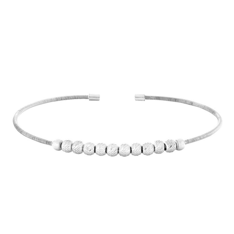 Rhodium finish sterling silver cable cuff bracelet with ten diamond cut spinning beads