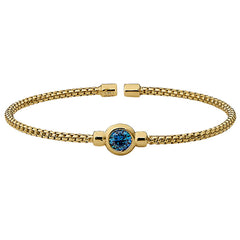 Gold finish sterling silver rounded box link cuff bracelet with bezel set simulated blue topaz birth gem