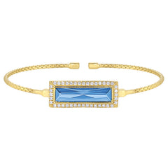 Gold finish sterling silver cable cuff bracelet with rectangular simulated blue topaz stone and simulated diamonds