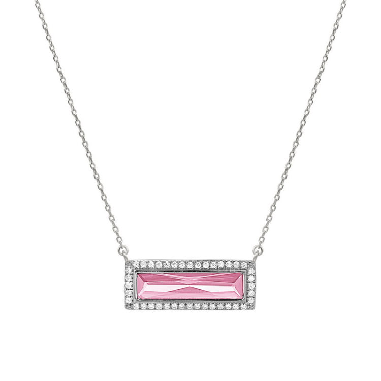 Rhodium finish sterling silver necklace with rectangular simulated pink sapphire stone and simulated diamonds on 16 - 18 cha