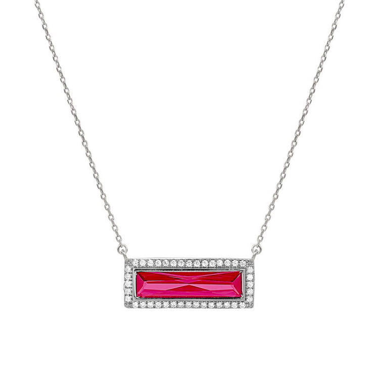 Rhodium finish sterling silver necklace with rectangular simulated ruby stone and simulated diamonds on 16 - 18 chain