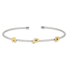 Rhodium finish sterling silver corean cable cuff bracelet with 3 gold finish knots with simulated diamonds on the center kno
