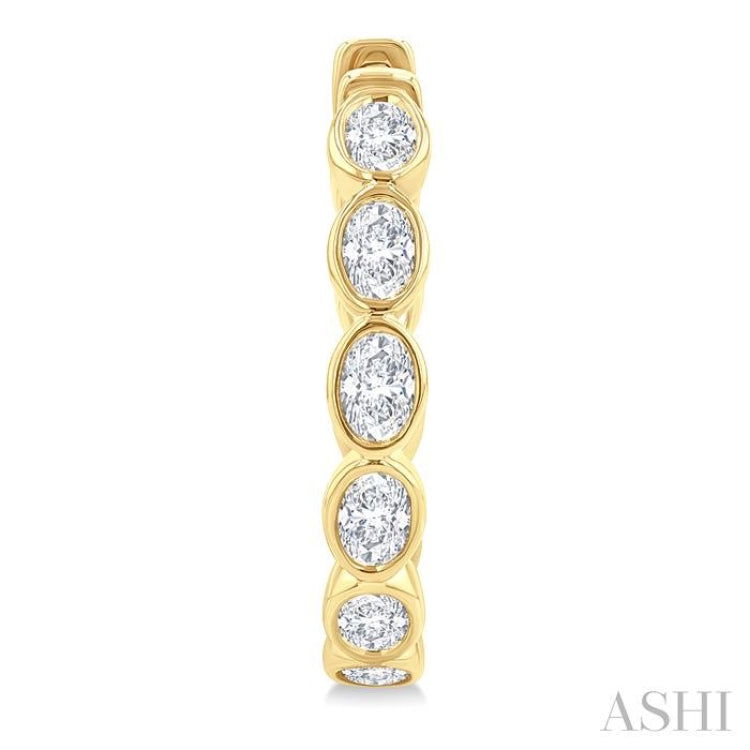 1 1/10 Ctw Bezel Set Oval Cut Diamond Fashion Hoop Earring in 14K Yellow Gold