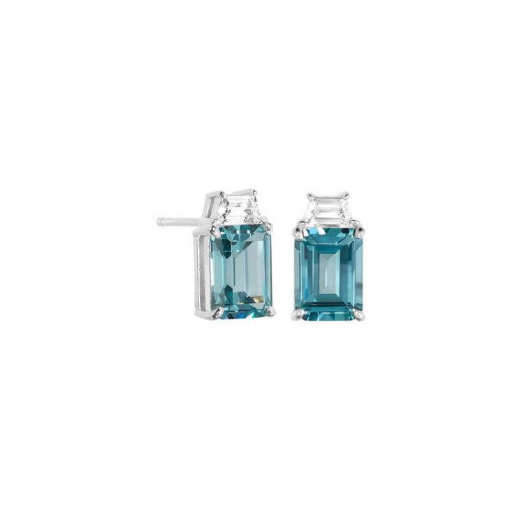 Platinum finish sterling silver zircon blue spinel princess cut earrings with simulated diamonds.